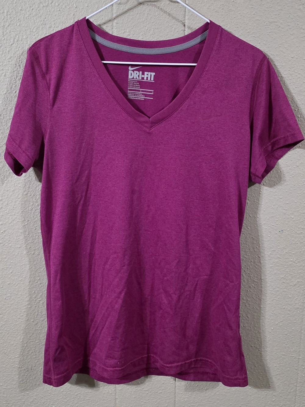 Nike Women's V-Neck Dri-FIT Tee in Magenta